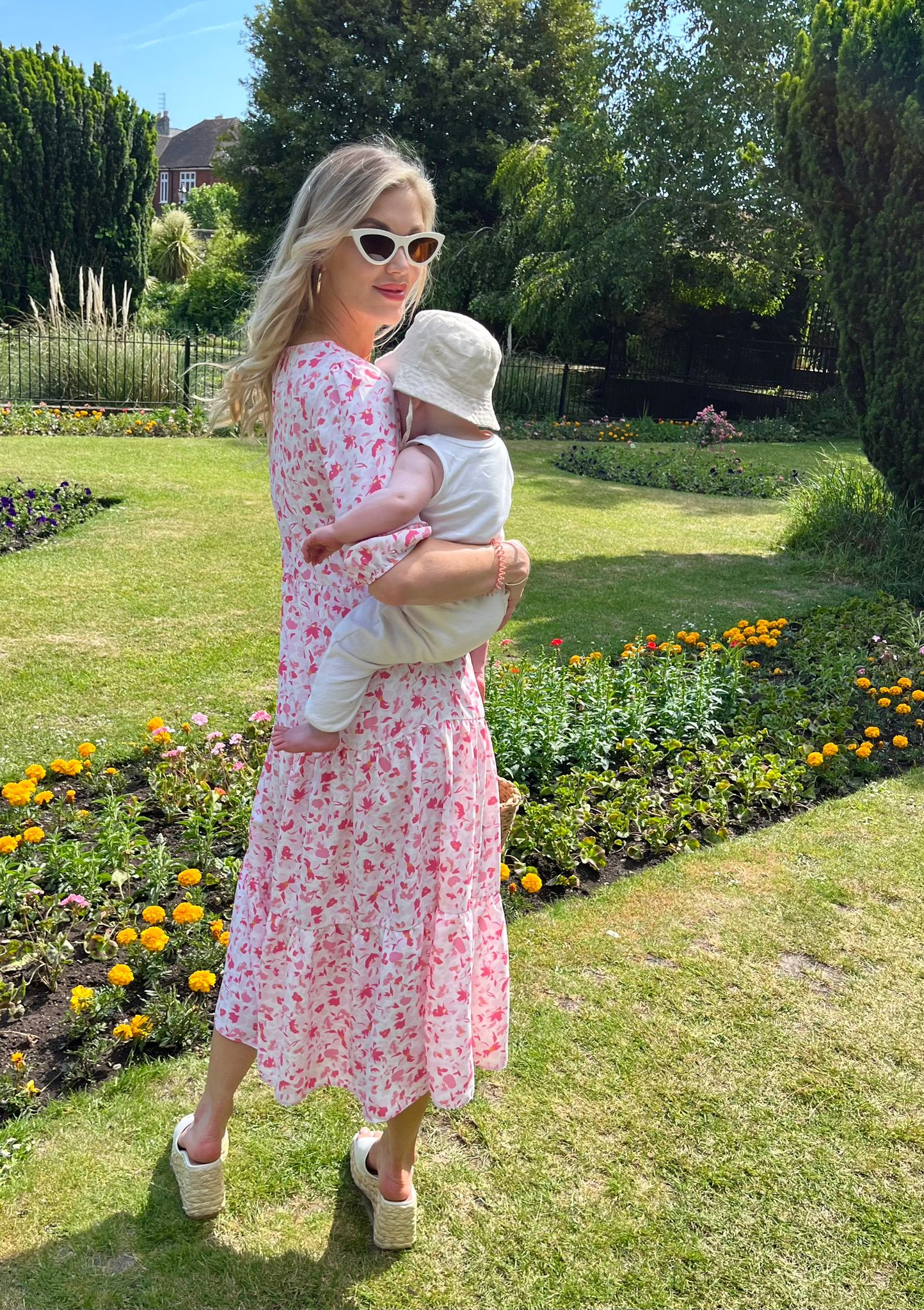 breastfeeding dress Dahlia Eyelet Maternity & Nursing | Navy - L and a silhouette that flows away from the body for a flattery fit The Steffi Breastfeeding Dress